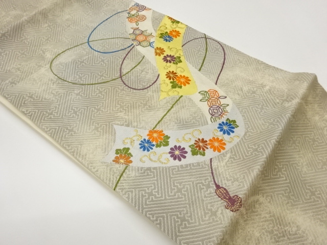 熨斗に花々・紗綾形模様織出し名古屋帯